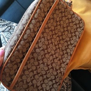 Coach tan signature clutch